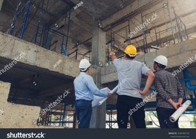 stock-photo-construction-concept-of-engineer-and-architect-working-at-construction-site-with-blue-print-1006780723